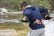 © dream@do - Sport injury, Man with back pain. Pain relief and health care concept.