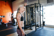 © Inti St Clair/Blend Images - Woman sweating after workout in gym