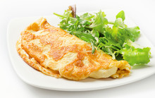 Omelette With Fresh Salad On White Plate