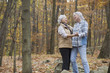 © Jasper Cole/Blend Images - Caucasian women dancing outdoors in autumn