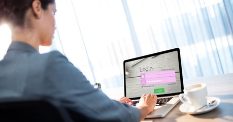 Poster - Businesswoman using log in page of website on laptop