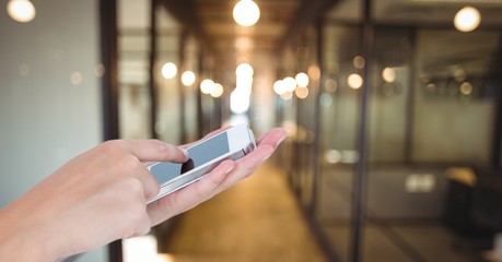 Poster - Hand touching blank screen of smart phone in office