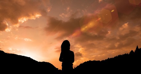Poster - silhouette girl standing on mountain against sky during sunset