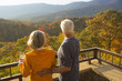© WHL/Blend Images - Older Caucasian couple enjoying wine and scenic view