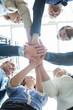 © 4frame group - business people teamwork stacking hand together