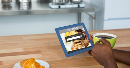 Poster - Online food app on tablet PC held by man holding coffee