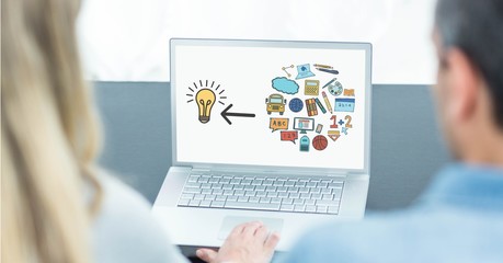 Poster - Couple using laptop with various icons on screen at table