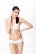 © producer - portrait of smiling young brunette woman with perfect sporty body in white underwear  on white background