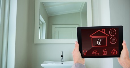 Poster - Hands using smart home application on digital tablet in washroom