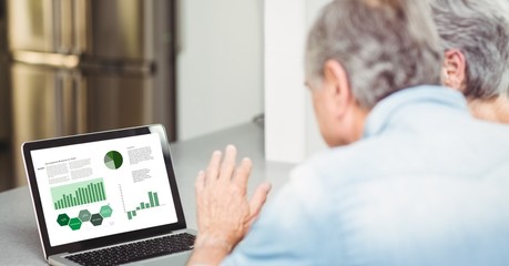 Poster - Senior business couple looking at graph and chart in laptop