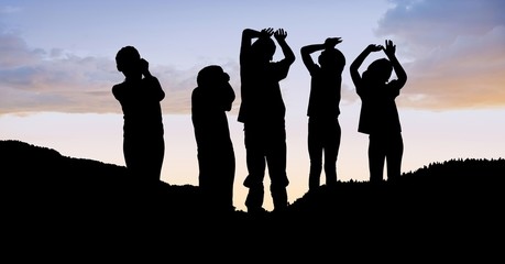 Poster - Silhouette children on hill against sky