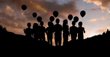 Poster - Silhouette children with balloons against sky