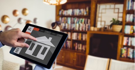 Poster - Hand using smart home application on digital tablet