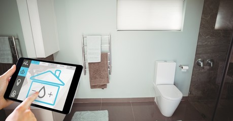 Poster - Hand using smart home application on digital tablet in washroom