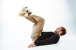 © master1305 - A portrait of a fan with ball on gray studio background. Freestile
