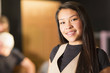© Marc Romanelli/Blend Images - Portrait of smiling Mixed Race teenage girl