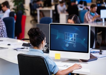 Poster - Woman using computer with Shopping trolley icon
