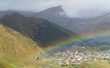 Rainbow over the Georgian village of Stepantsminda after the rain