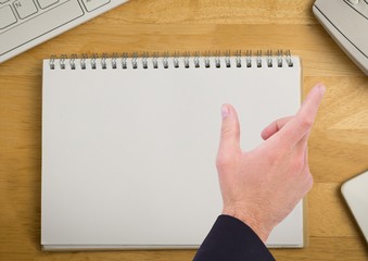 Poster - Hand over notepad on desk
