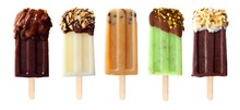 Five assorted chocolate themed popsicles isolated on a white background