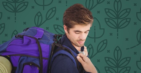 Poster - Man with backpack against green nature pattern