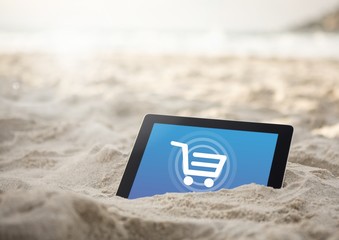 Poster - Tablet in the sand beach with Shopping trolley icon