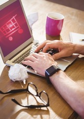 Poster - Person using Tablet with Shopping trolley icon