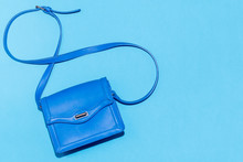 Blue Purse On A Colorful Blue Background