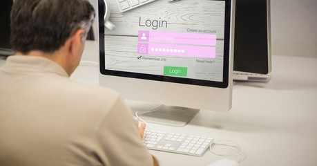 Poster - Rear view of businessman logging in on site using computer