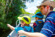 © Irina Schmidt - Two little kids boys and father making air boat tour in Everglades Park