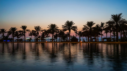 Wall Mural - Dubai. In the summer of 2016. A water oasis in the evening on the territory of Madinat Jumeirah Mina a Salam
