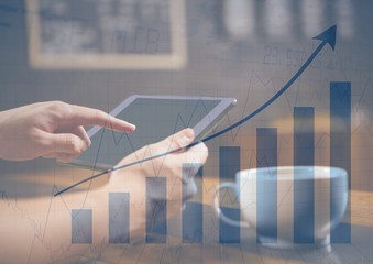 Poster - Hands with tablet in cafe and blue graph overlay