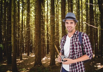 Wall Mural - mountain travel, men with hat in the forest