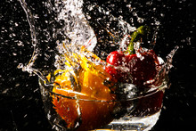 Splash Water Red And Yellow Pepper Chili Drop In Water 