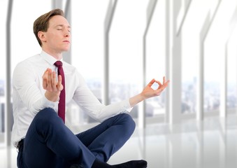 Poster - Business man meditating against blurry white window