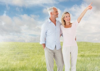 Canvas Print - Couple walking in meadow nature