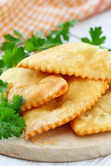 Wall Mural - National cuisine. Fried meat pie cheburek