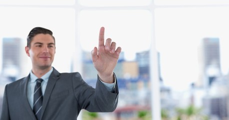 Poster - Smiling businessman touching transparent screen