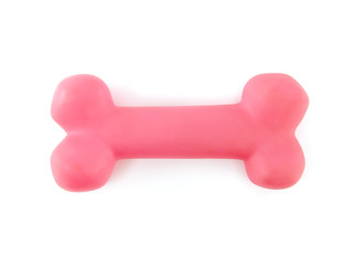 pink rubber bone isolated on white background, top view puppy dog toy