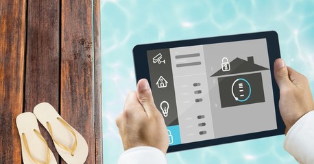 Poster - Hands using smart home app at poolside