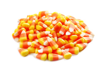 Wall Mural - Colorful Halloween candy corns on white background