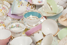High Resolution Close-up Of A Beautiful Antique Tea Cups And Saucers Collection, Isolated On A White Background.