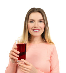 Poster - Beautiful woman with glass of fresh juice on white background