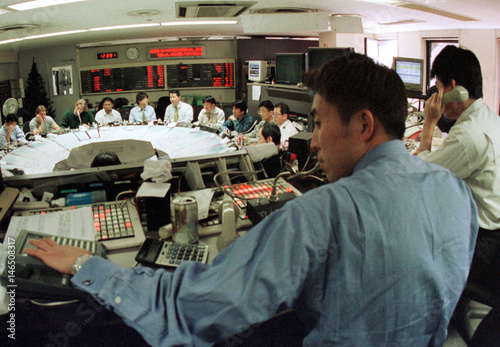 Money Dealers Trade At A Tokyo Foreign Exchange Brokerage November - 