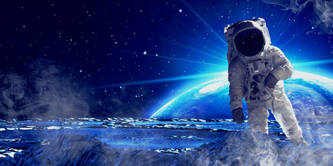 Wall Mural - astronaut in outer space.
