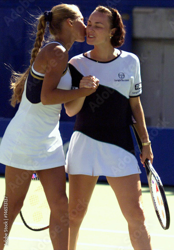 Anna Kournikova (L) from Russia kisses doubles partner Martina ...