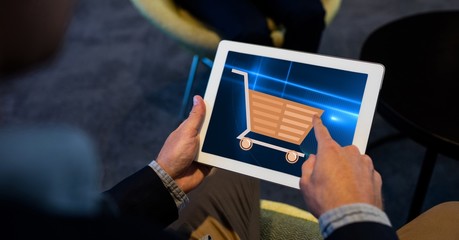 Poster - Hand touching shopping cart sign on tablet PC