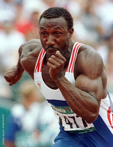Englands Linford Christie Charges Out Of The Starting - 