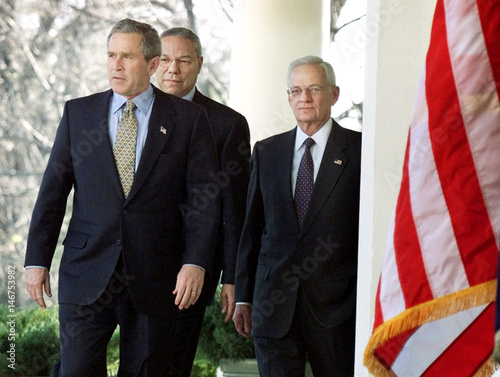 Us President George W Bush Walks With Cabinet Members To