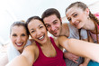 © nenetus - Group of people taking a selfie after yoga session.